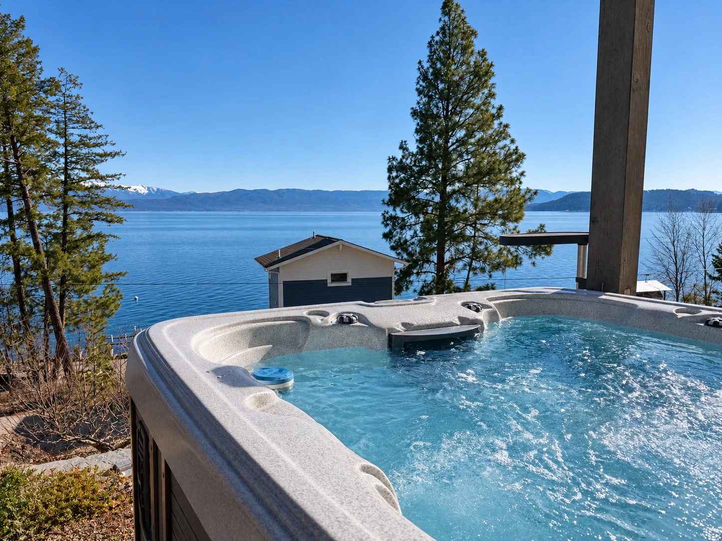 Clear hot tub water with a lake view