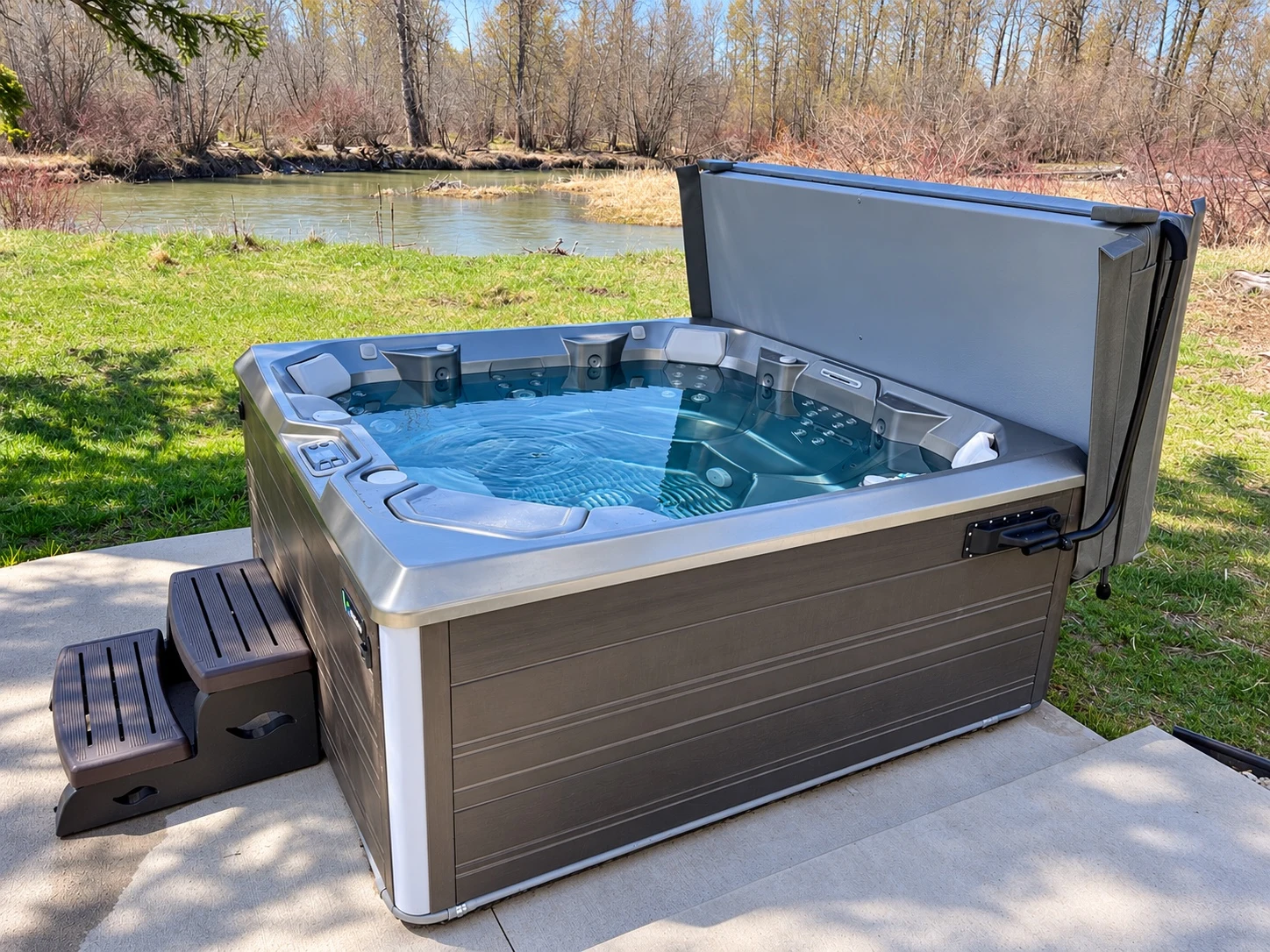 Outdoor hot tub beside a river